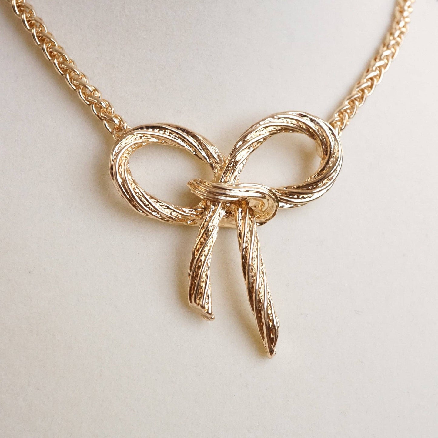 Large Gold Rope Textured Bow Pendant Necklace