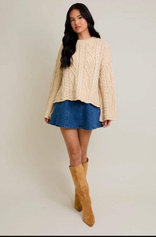 OVERSIZED CABLE KNIT SWEATER