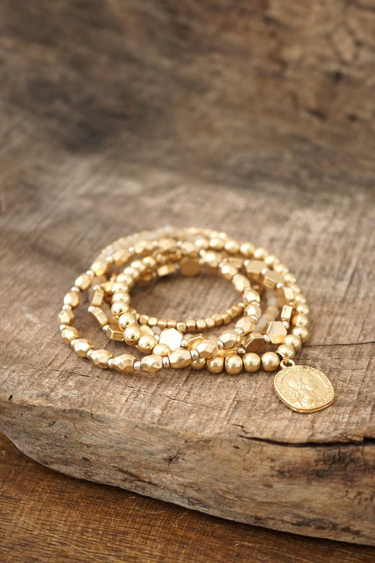 Boho Bracelet Stack with a Coin in worn gold tone