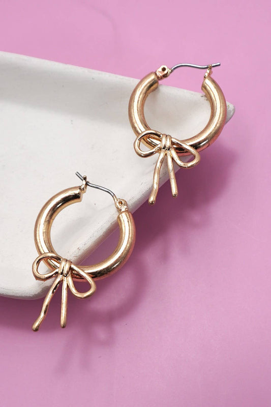 WORN GOLD BOW PUFFY HOOP EARRINGS