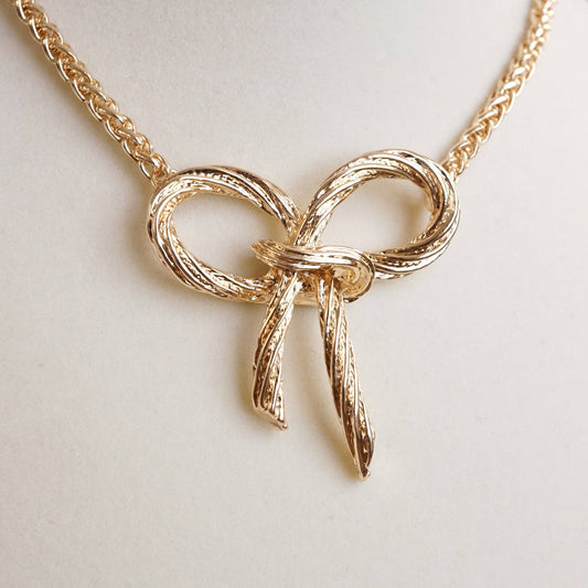 Large Gold Rope Textured Bow Pendant Necklace